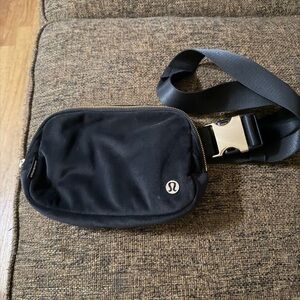 lululemon athletica Black velour Belt Bag with gold Buckle